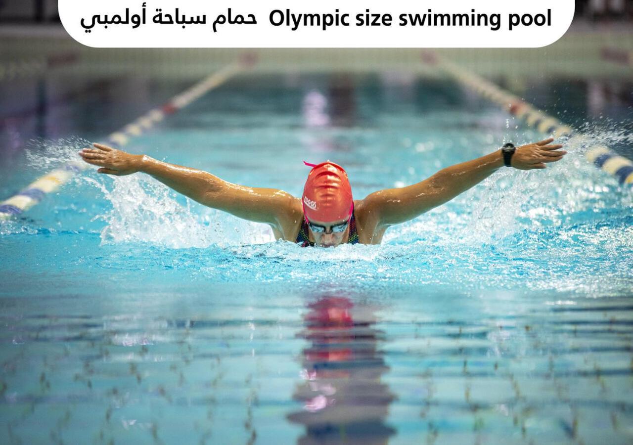 Officers Club & Hotel Абу Даби Екстериор снимка Olympic size swimming pool