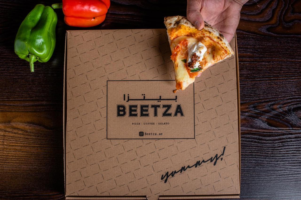Officers Club & Hotel Абу Даби Екстериор снимка Beetza pizza